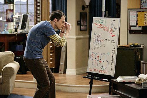 An image of Sheldon cooper zooming in his white board.